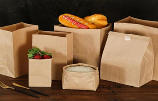 Quel équipement est le plus approprié pour la production de machines à sacs en papier ?